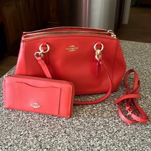 Burnt orange Coach purse and wallet